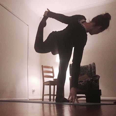 Image 1: Laura in side crow pose with split legs on a blue yoga matt outside on red pavers. Image 2: Black and white image of Laura outside on pavers in child's pose, a brick wall and sliding door in background. Image 3: Laura wearing colourful yoga pants in half lift, outside with a while mug at the top of her blue mat. Image 4: Laura in bambook pose in low light before sunrise in side, a wooden chair and rocking chair in the background. Image 5: Laura sitting on her blue yoga mat patting her white bun Percy on floating floors. Image 6: Laura in red pj pants with legs up the wall.