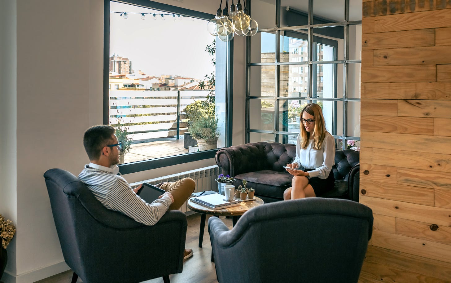 Two people in a meeting