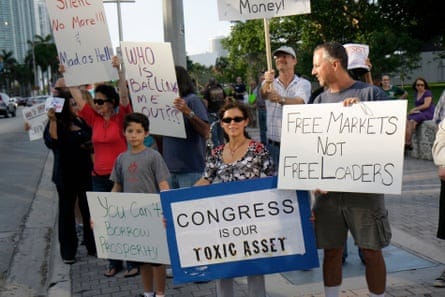 people holding signs people holding signs