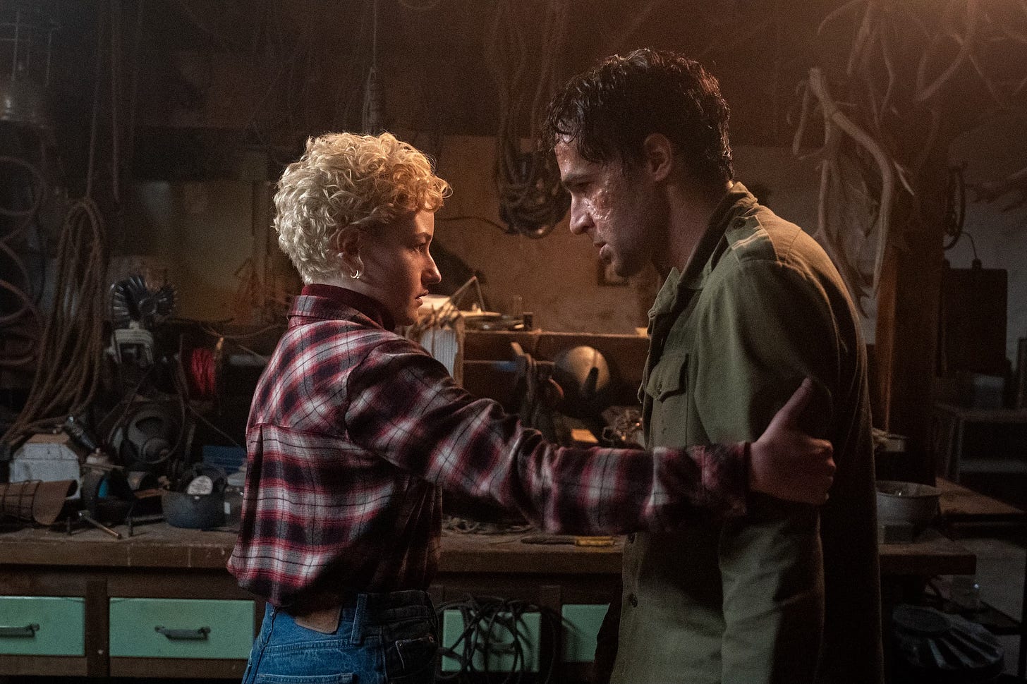 Julia Garner as Charlotte and Christopher Abbott as Blake in Wolf Man Julia Garner as Charlotte and Christopher Abbott as Blake in Wolf Man