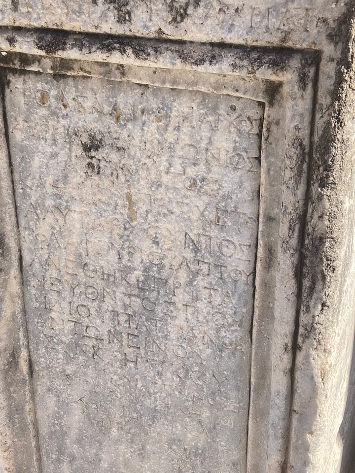 Various texts on scrolls or carved into stones plus the Library at Celcus