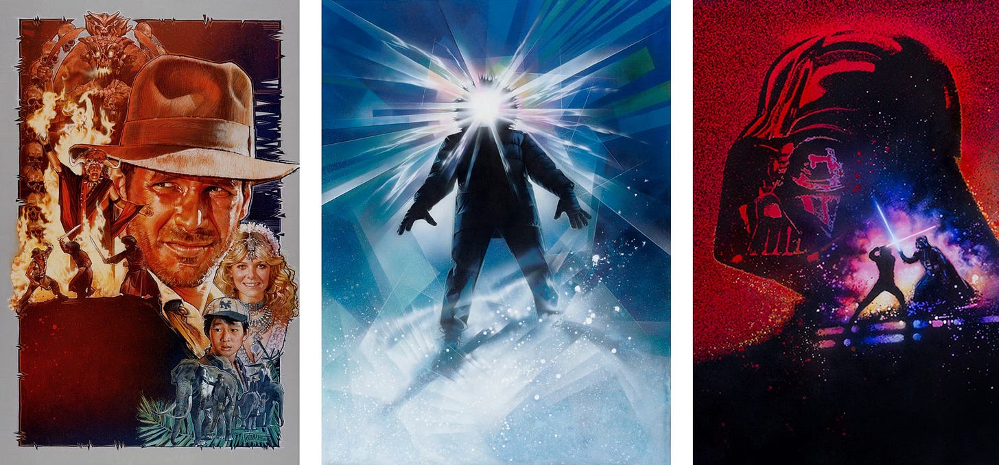 LEFT: Indiana Jones and the Temple of Doom (1984), Acrylic paints & colored pencils on gessoed board - 30 x 40. Montage of faces with the largest being Harrison Ford as Indiana Jones in his signature hat, Kate Capshaw as Willie Scott wearing elborate jewels, a young Key Huy Quan as Short Round in ballcap. The tribal antagonists are portrayed in warm colors in the upper left while Indy guiding a pack of elephants is in cool colors in the lower right.  CENTER: The Thing (1982), Acrylic paints and colored pencils on gessoed board - 30 x 40. Light shines outward from a silhouetted figure in parka with hood up, creating an abstract shattered crystal, prismatic effect.  RIGHT: Revenge of the Jedi (1983), Acrylic paints and colored pencils on board - 30 x 40. The helmet of Darth Vader against a grainy red background. The right fades to a star field filled in the lower half by the duel between Luke and Vader. Their lightsabers cross—Luke’s red and Vader’s blue—backed by a brilliant haze of pink and blue.