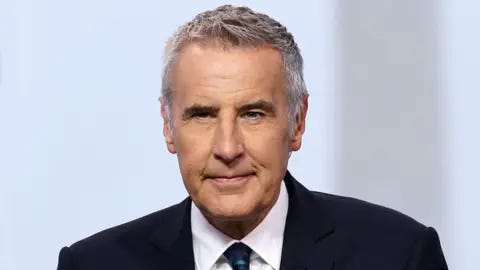 Getty Images Dermot Murnaghan in a suit looking slightly off camera