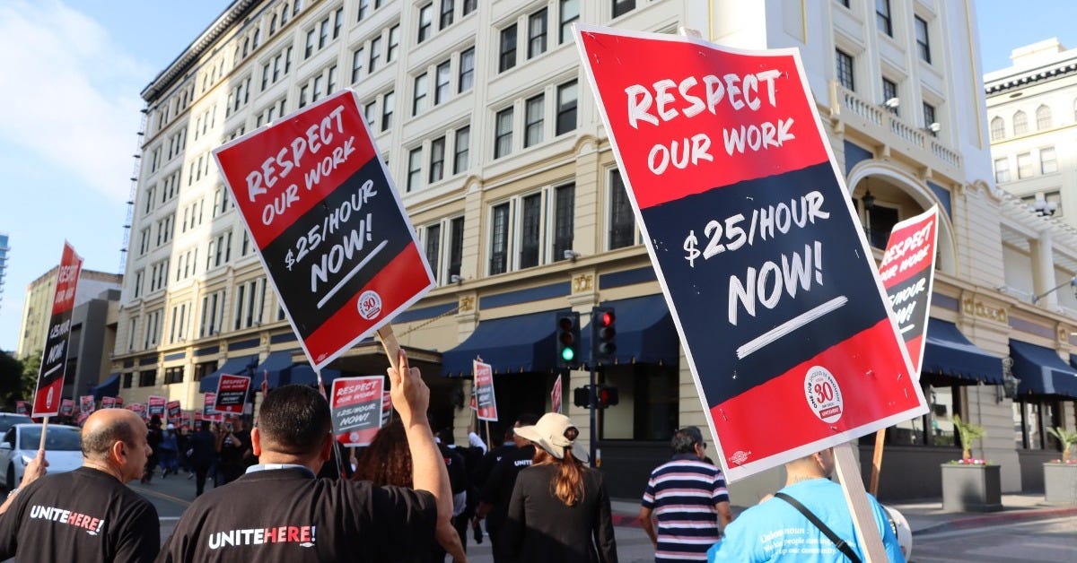 Hospitality Workers March Downtown in Support of $25 Minimum Wage