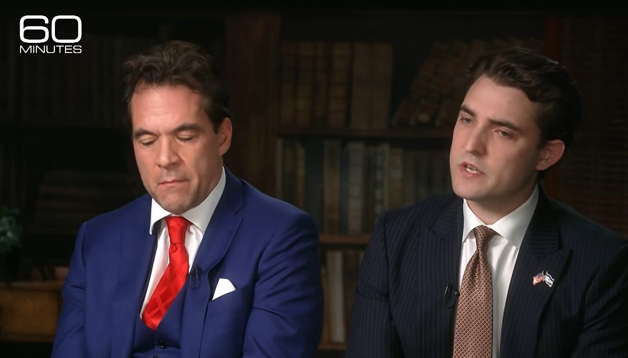 two con men, one older and in a rumpled blue suit, the other younger and looking like Howdy Doody on an ether binge, on 60 Minutes. two con men, one older and in a rumpled blue suit, the other younger and looking like Howdy Doody on an ether binge, on 60 Minutes.