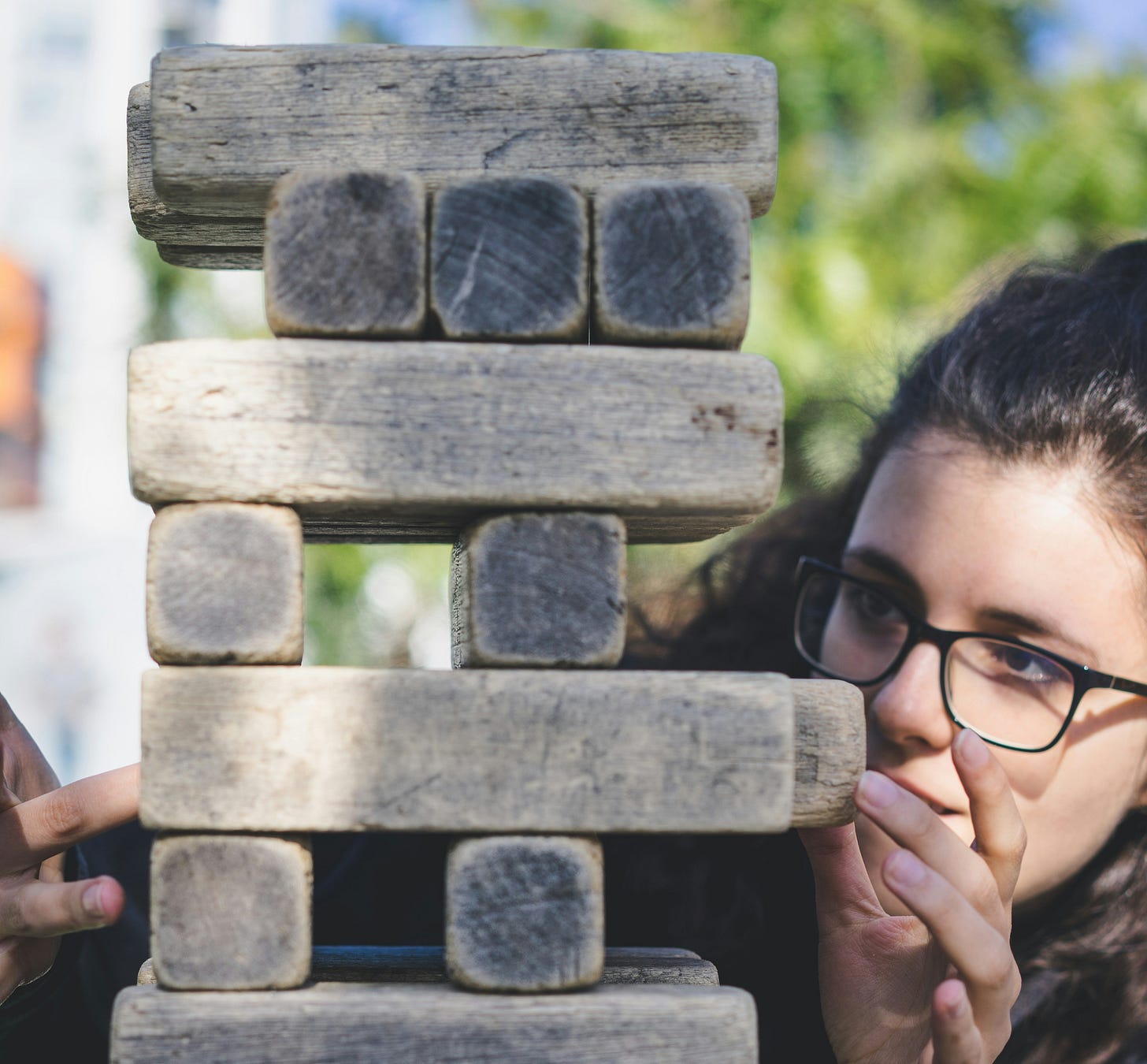 person playing jenga