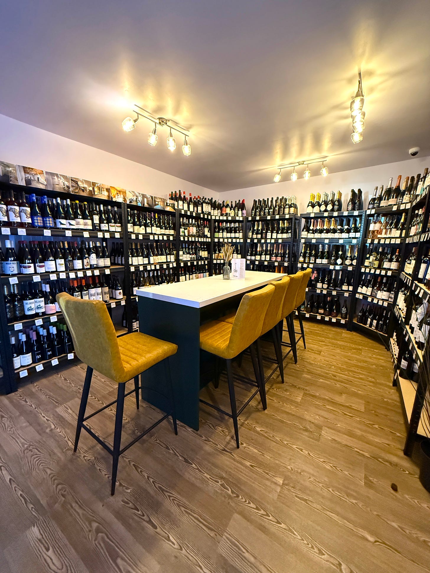 bottles on the shelves of wine shop and bar Cru Didsbury
