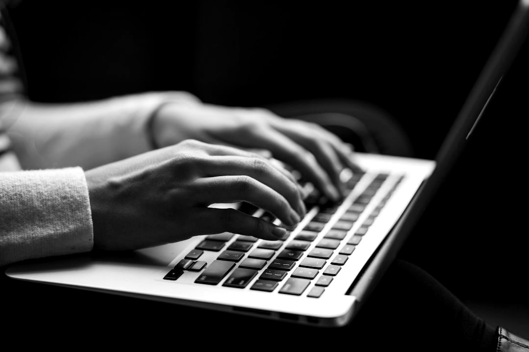 person using laptop person using laptop