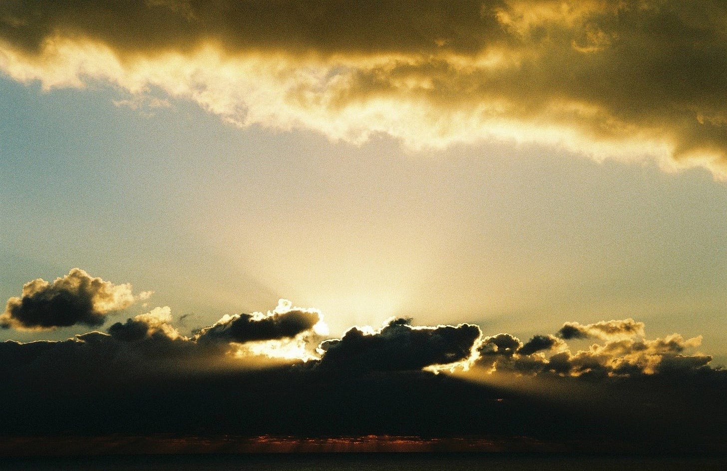 Sun shines from behind some dark clouds over the Atlantic Sun shines from behind some dark clouds over the Atlantic