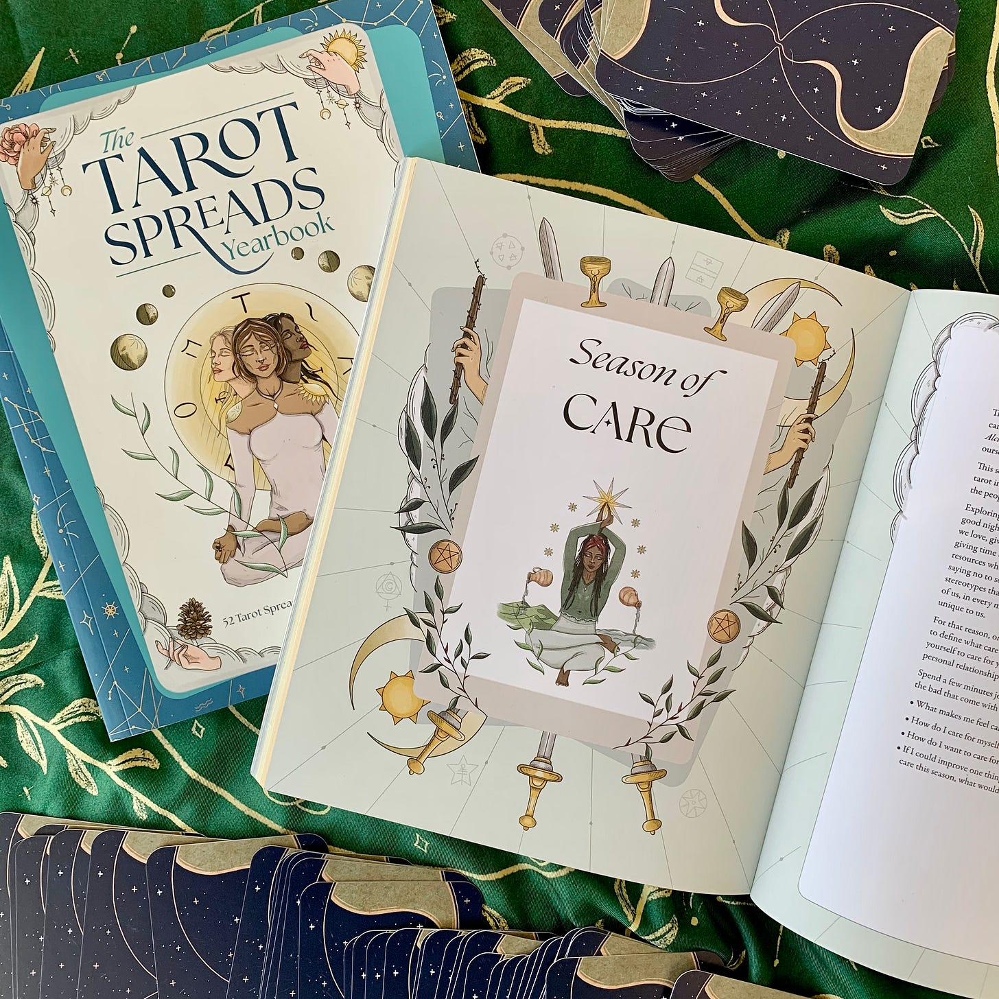 The Tarot Spreads Yearbook by Chelsey Pippin Mizzi, open to the Season of Care chapter The Tarot Spreads Yearbook by Chelsey Pippin Mizzi, open to the Season of Care chapter