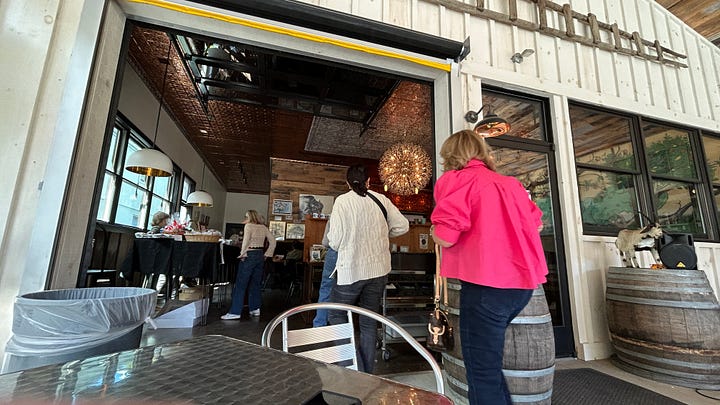 Photos of the entrance of Molley Chomper cidery.