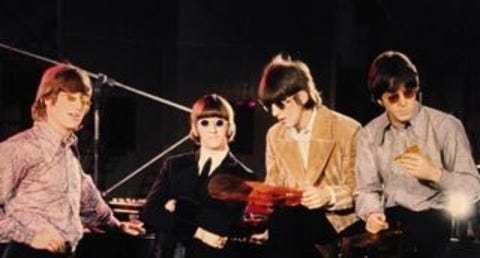 Photograph of The Beatles during the Revolver album photoshoot, circa 1966. Photograph of The Beatles during the Revolver album photoshoot, circa 1966.