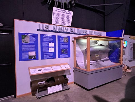displays, exhibits, signs, planes