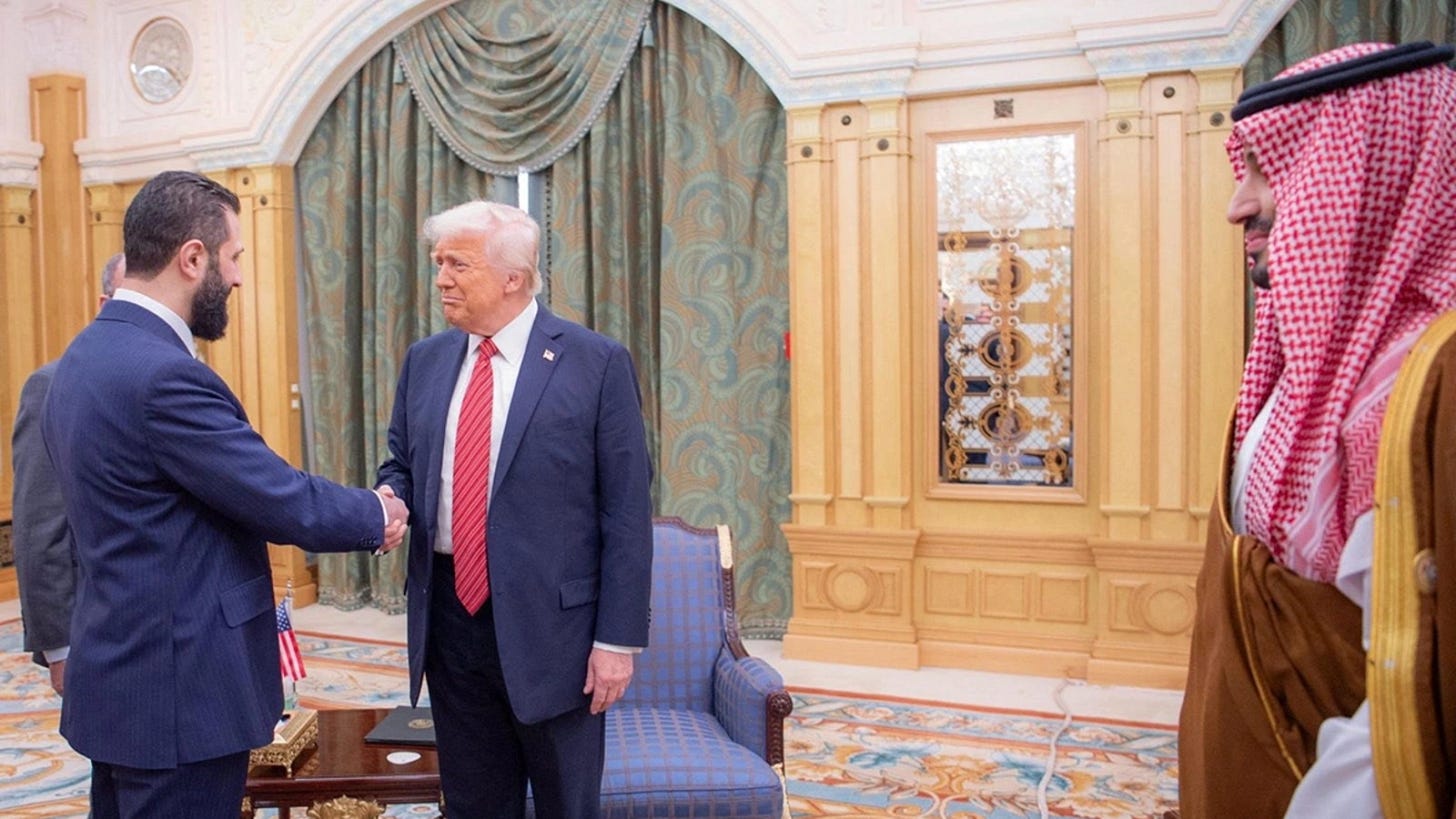 U.S. President Donald Trump meets with Syrian President Ahmed al-Sharaa in Riyadh, Saudi Arabia.