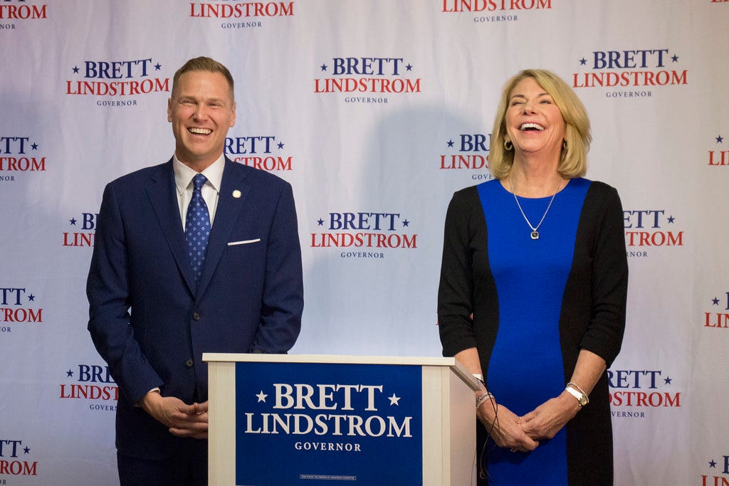 [Photo with caption] Brett Lindstrom and Jean Stothert