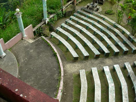 Doorways, stairs, amphitheater, shopping. Places and people of change.