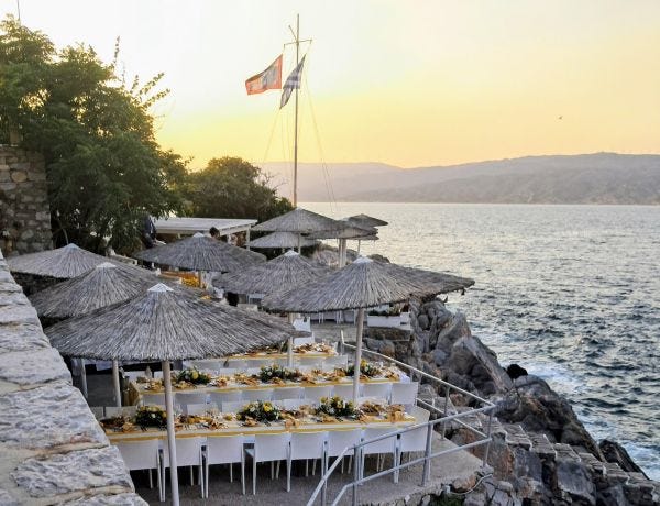 The wedding reception dinner set up at the Spilia Beach Bar