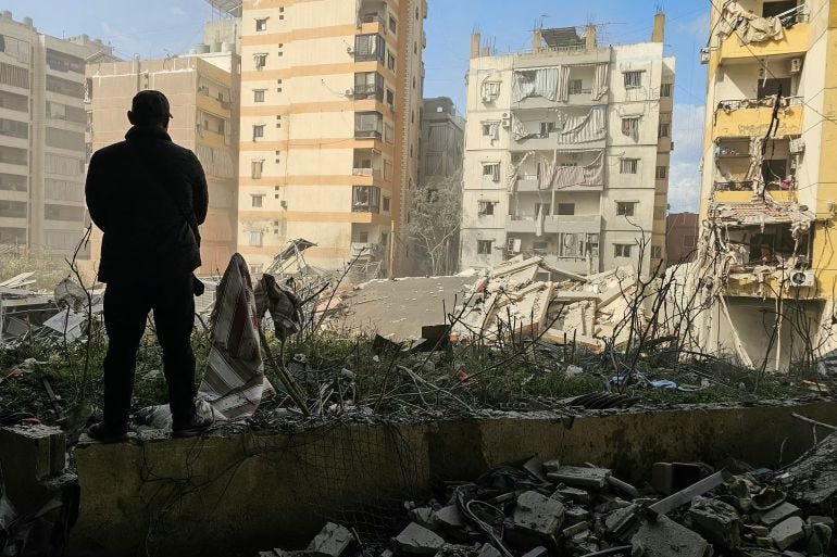 A man looks at the damage at the site of an Israeli airstrike that targeted the Al Lailaki neighbourhood in Beiruts southern suburbs A man looks at the damage at the site of an Israeli airstrike that targeted the Al Lailaki neighbourhood in Beiruts southern suburbs