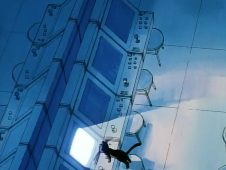 This may contain: a black cat sitting on top of a window sill next to a tall building