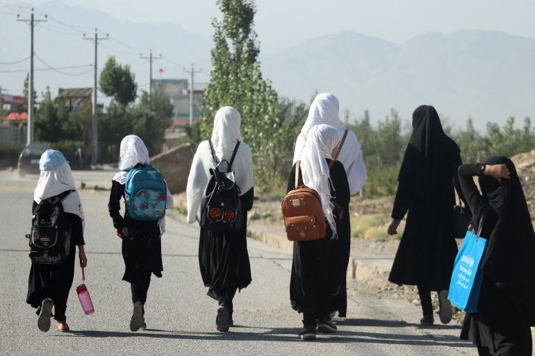 Girls walk to their school along a road in Gardez, Paktia porvince, on September 8, 2022. - Five government secondary schools for girls have resumed classes in eastern Afghanistan after hundreds of students demanded they reopen, provincial officials said on September 8. Girls walk to their school along a road in Gardez, Paktia porvince, on September 8, 2022. - Five government secondary schools for girls have resumed classes in eastern Afghanistan after hundreds of students demanded they reopen, provincial officials said on September 8.