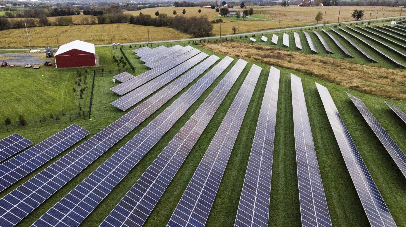 FILE - Farmland is seen with solar panels from Cypress Creek Renewables, Oct. 28, 2021, in Thurmont, Md. The Senate has approved a measure that would reinstate tariffs on solar panel imports from several Southeast Asian countries after President Joe Biden paused them in a bid to boost solar installations in the U.S. (AP Photo/Julio Cortez, File) FILE - Farmland is seen with solar panels from Cypress Creek Renewables, Oct. 28, 2021, in Thurmont, Md. The Senate has approved a measure that would reinstate tariffs on solar panel imports from several Southeast Asian countries after President Joe Biden paused them in a bid to boost solar installations in the U.S. (AP Photo/Julio Cortez, File)