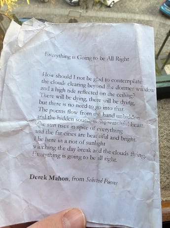 A faded and crumpled copy of Derek Mahon's poem 'Everything is going to be all right.'