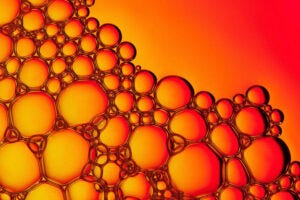 Biomolecular condensates often appear like soap bubbles but are actually more like Silly Putty, featuring mostly elastic and viscous behaviors on different time scales. WashU researchers have devised a method to image the internal organization within condensates to arrive at a structural explanation for condensate viscoelasticity. (Image: Shutterstock)