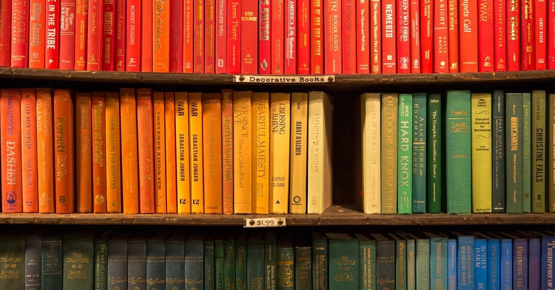 wooden bookcase filled with books wooden bookcase filled with books