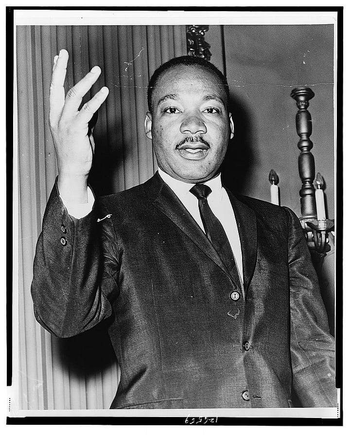 Dr. Martin Luther King Junior and three people from Hollywood Magazine