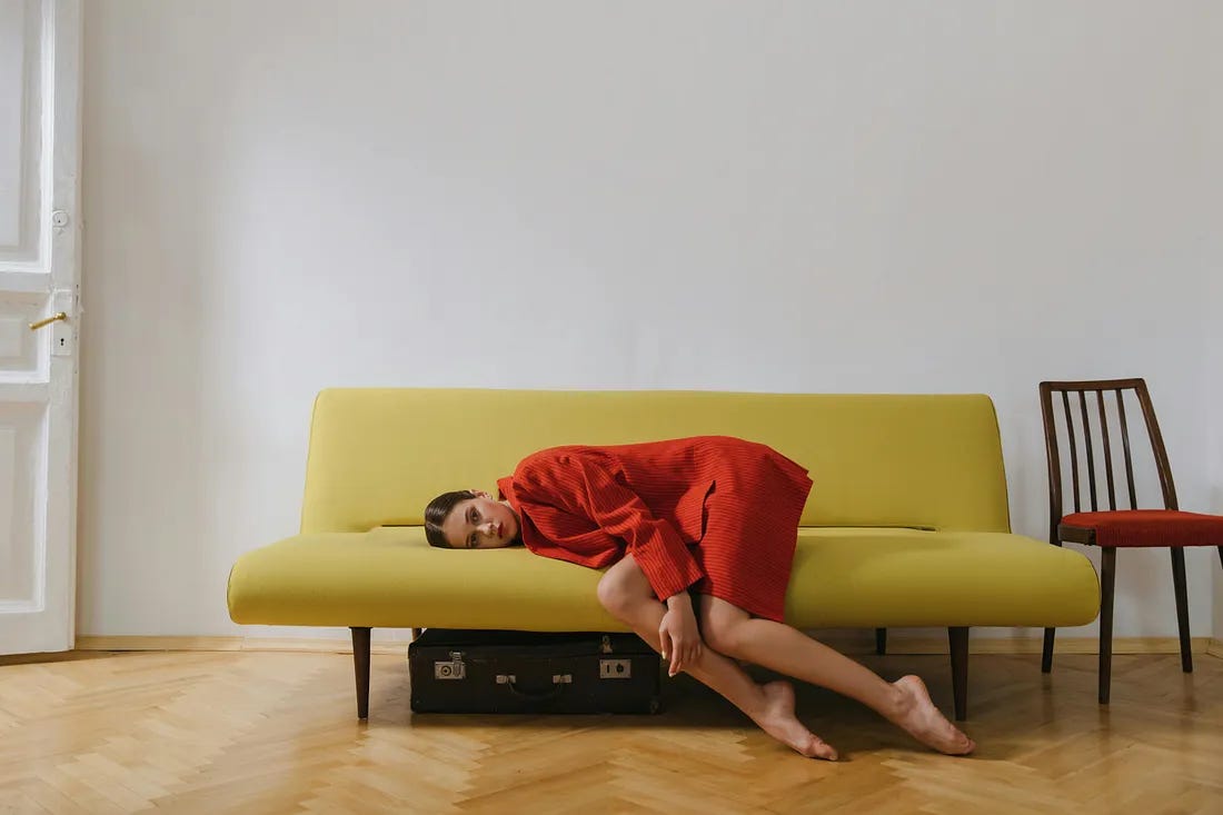 woman lying on the sofa woman lying on the sofa