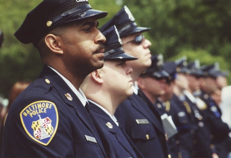 Police officers in dress blues Police officers in dress blues