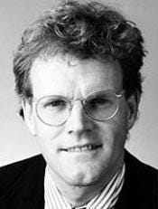 A person wearing glasses and a suit
Description automatically generated A person wearing glasses and a suit
Description automatically generated