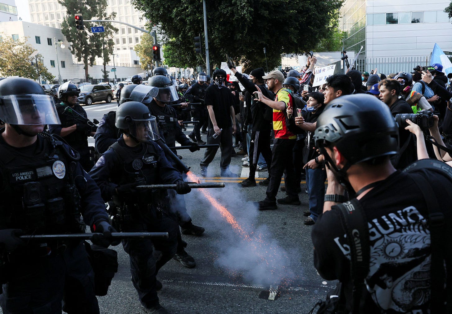 In pictures: Burning cars and tear gas in LA protests | CNN
