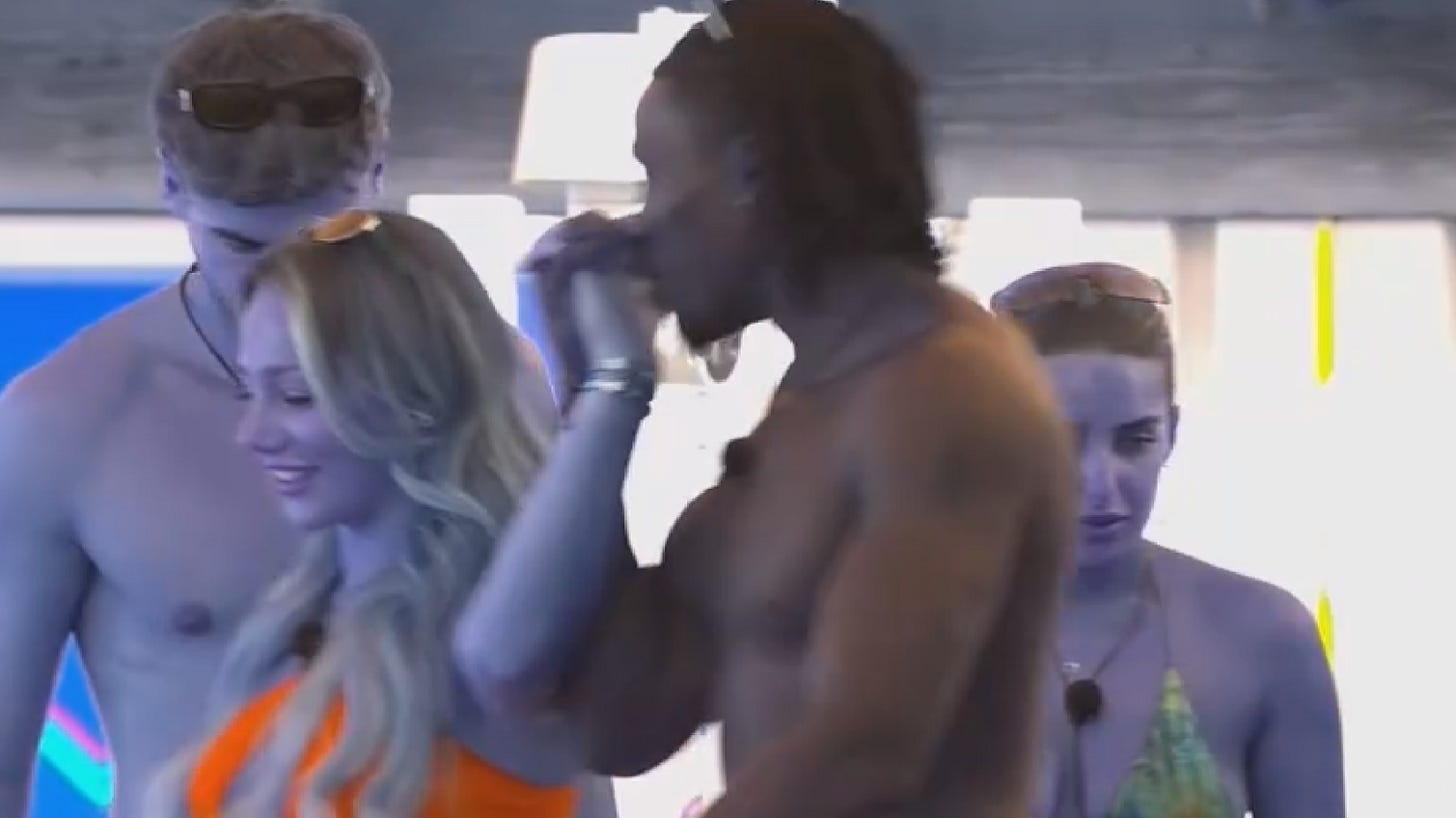 Dejon kissing Meg's hand as they leave the villa. Dejon kissing Meg's hand as they leave the villa.