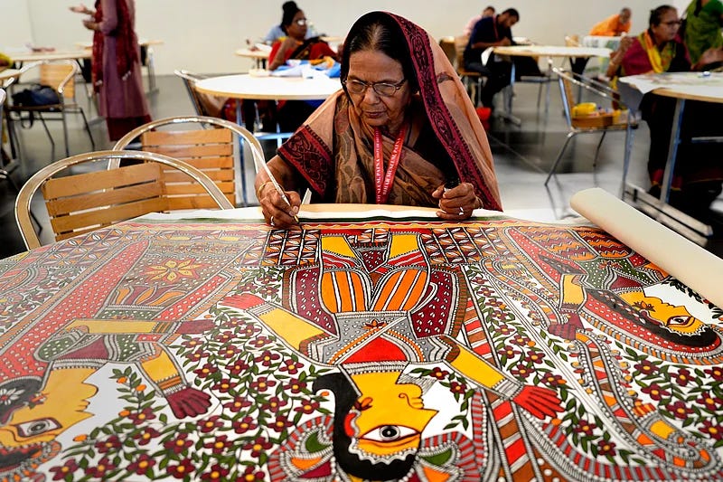 Padmashree awardee Baua Devi reclaiming Sita through Mithila style painting at Bihar Museum Photo: SURESH K PANDEY Padmashree awardee Baua Devi reclaiming Sita through Mithila style painting at Bihar Museum Photo: SURESH K PANDEY