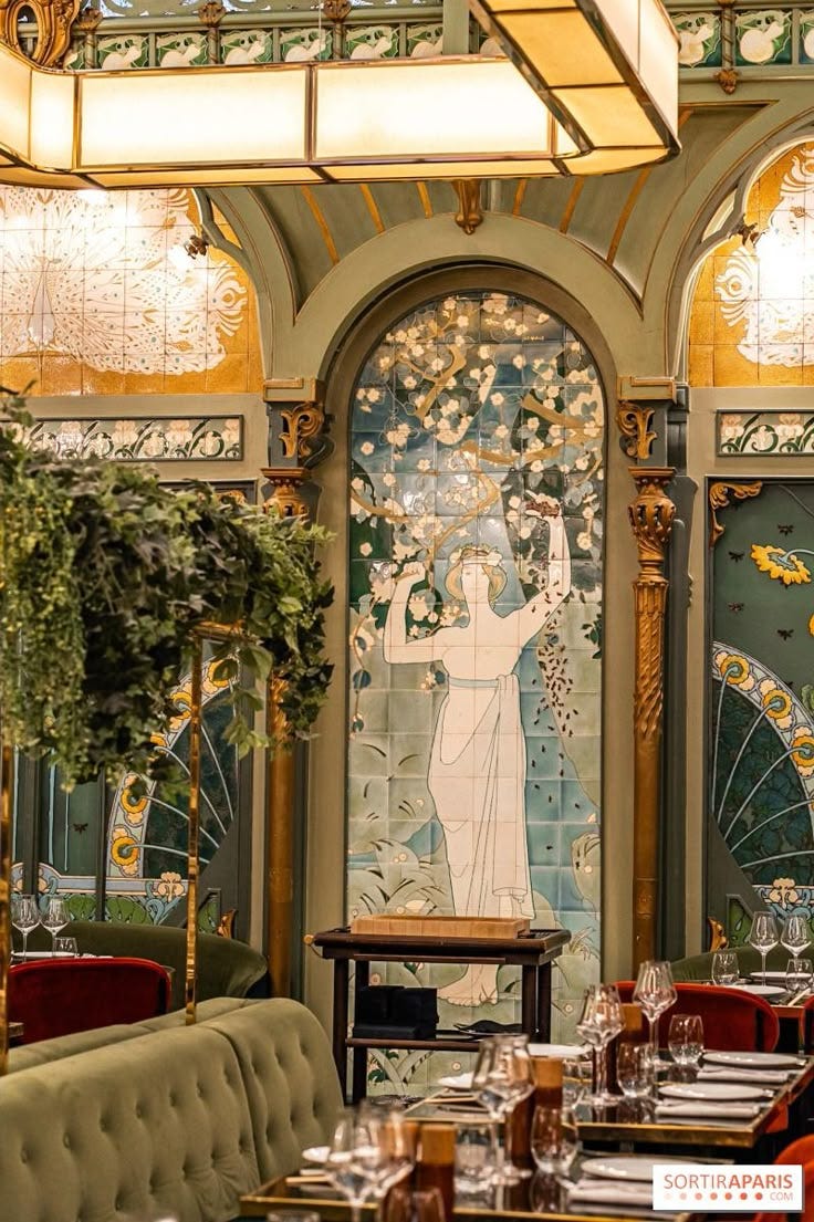 This may contain: an ornately decorated dining room with tables and chairs in front of a stained glass window This may contain: an ornately decorated dining room with tables and chairs in front of a stained glass window