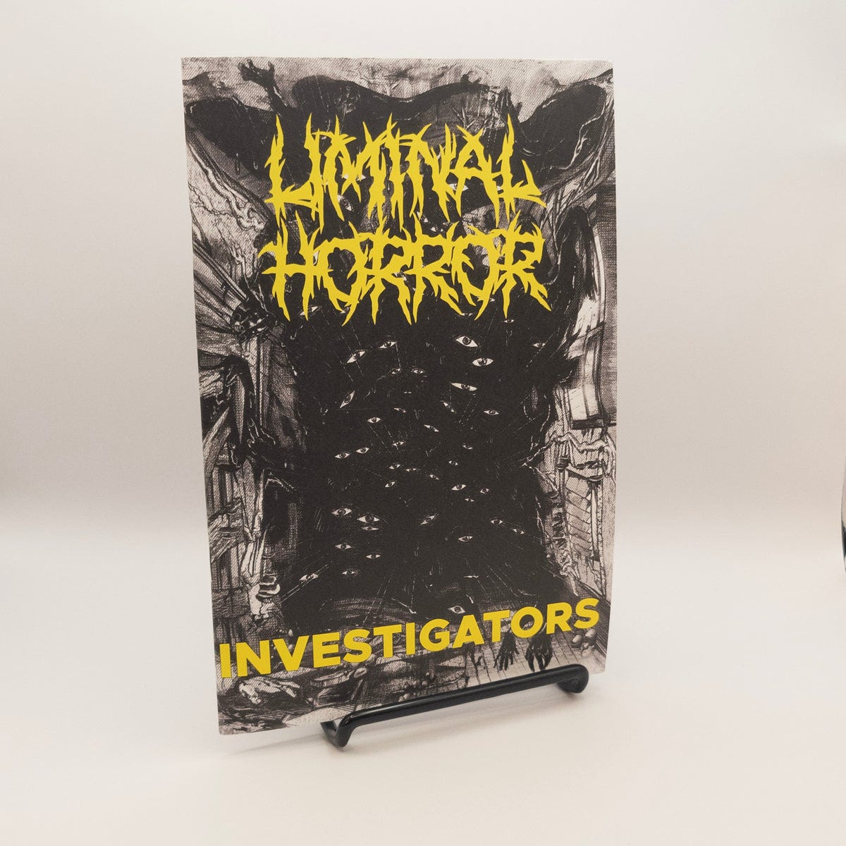 Liminal Horror Investigators (for Liminal Horror RPG). Dark hallway with staring disembodied eyes and hands reach forth. 