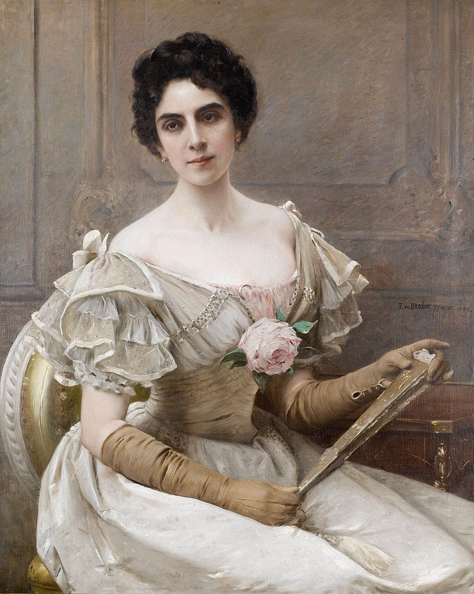 a portrait of a woman with dark hair and a white dress with a large flower in the middle of the bust sitting in a chair and holding a fan