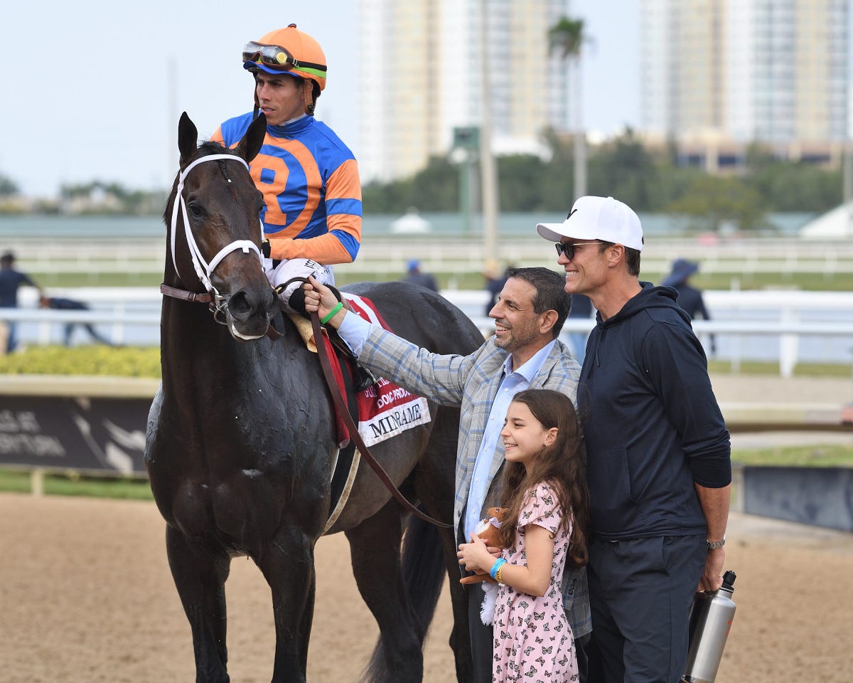 Gulfstream Park Mile (G2) winner Mindframe and Irad Ortiz Jr., with co-owner Mike Repole and former NFL quarterback Tom Brady