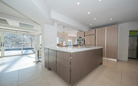 Dining room, kitchen, casual dining room, family room and rear patio