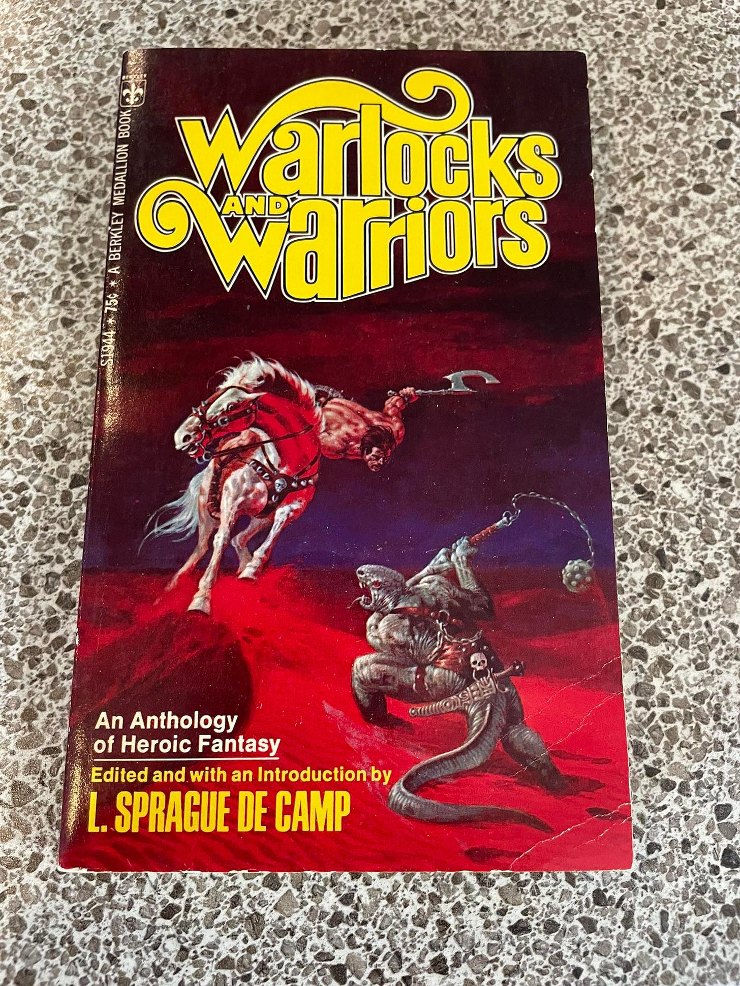 May be an image of text that says 'ဖြန်မ 100 O MEDALLION BERKLEY A 154 arriors warlocks AND ម្ួមកន្រ S1944 ်1944 CИИA An Anthology of Heroic Fantasy Edited and with an Introductionb by L.SPRAGUEDECA L. SPRAGUE DE CAMP ie'