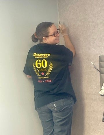 Photos of the team members doing various jobs.