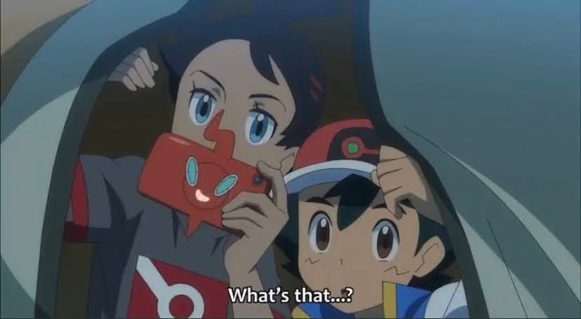 Ash and Goh from Pokemon Journeys emerging from a tent saying "What's that...?"