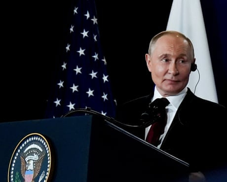 Putin at a lectern