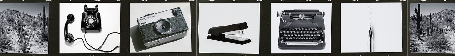A black-and-white film strip collage featuring a desert cactus landscape, rotary phone, vintage camera, stapler, typewriter, and armchair—symbols of business, silence, memory, and power.