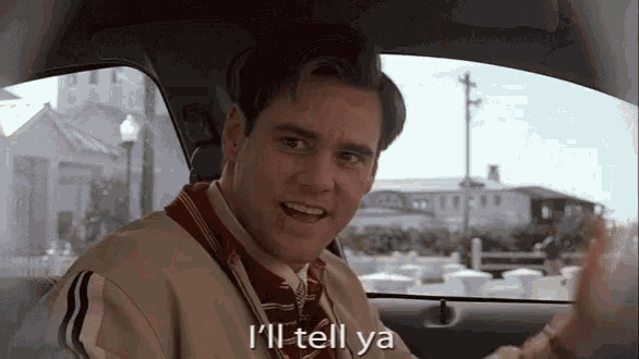 a man is sitting in a car and says i 'll tell ya a man is sitting in a car and says i 'll tell ya