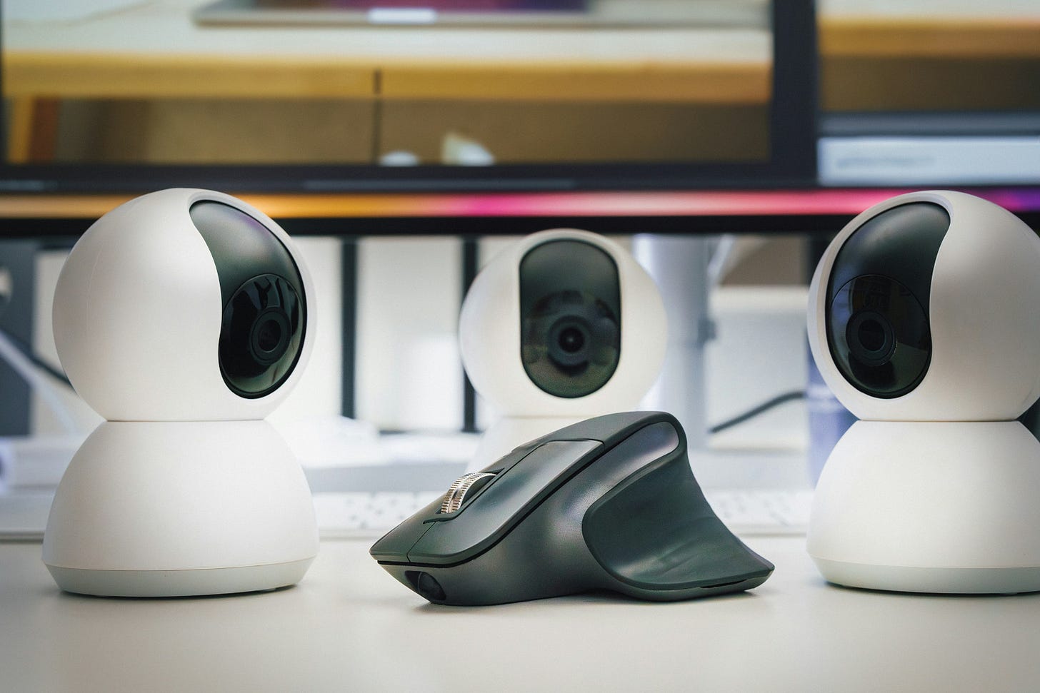Three surveillance web cameras observing computer mouse. Three surveillance web cameras observing computer mouse.