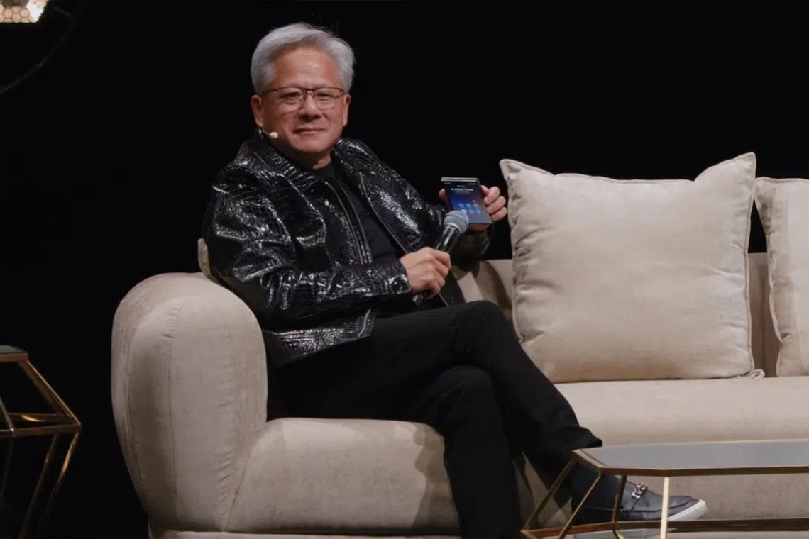 Nvidia CEO Jensen Huang puts Trump on speakerphone while downplaying AI risks | The Straits Times Nvidia CEO Jensen Huang puts Trump on speakerphone while downplaying AI risks | The Straits Times