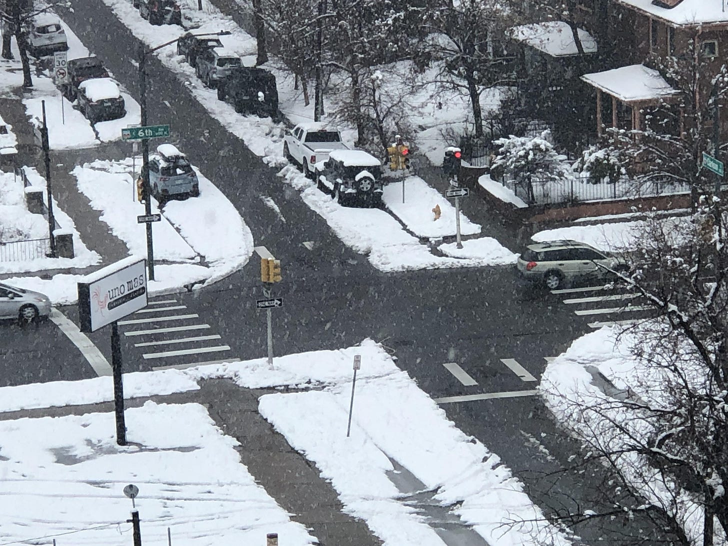 The snow curves at the intersection of two one-way roads :  r/mildlyinteresting