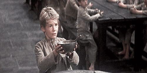 Movie gif. John Howard Davis as Oliver in Oliver Twist. He looks forlorn as he holds an empty bowl out and begs for more food. Movie gif. John Howard Davis as Oliver in Oliver Twist. He looks forlorn as he holds an empty bowl out and begs for more food.